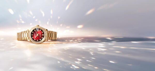 Rolex DAtejust in gold with red